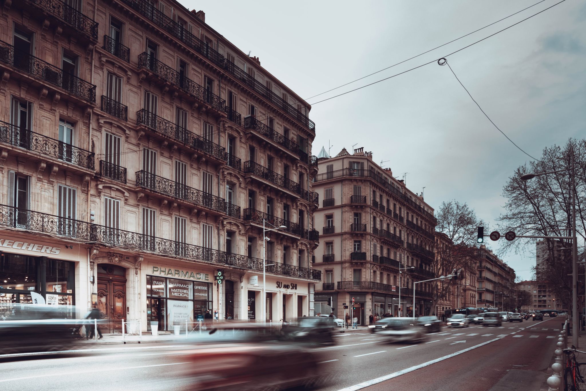 Historic architecture and bustling street in Toulon, Provence-Alpes-Côte d'Azur, France.